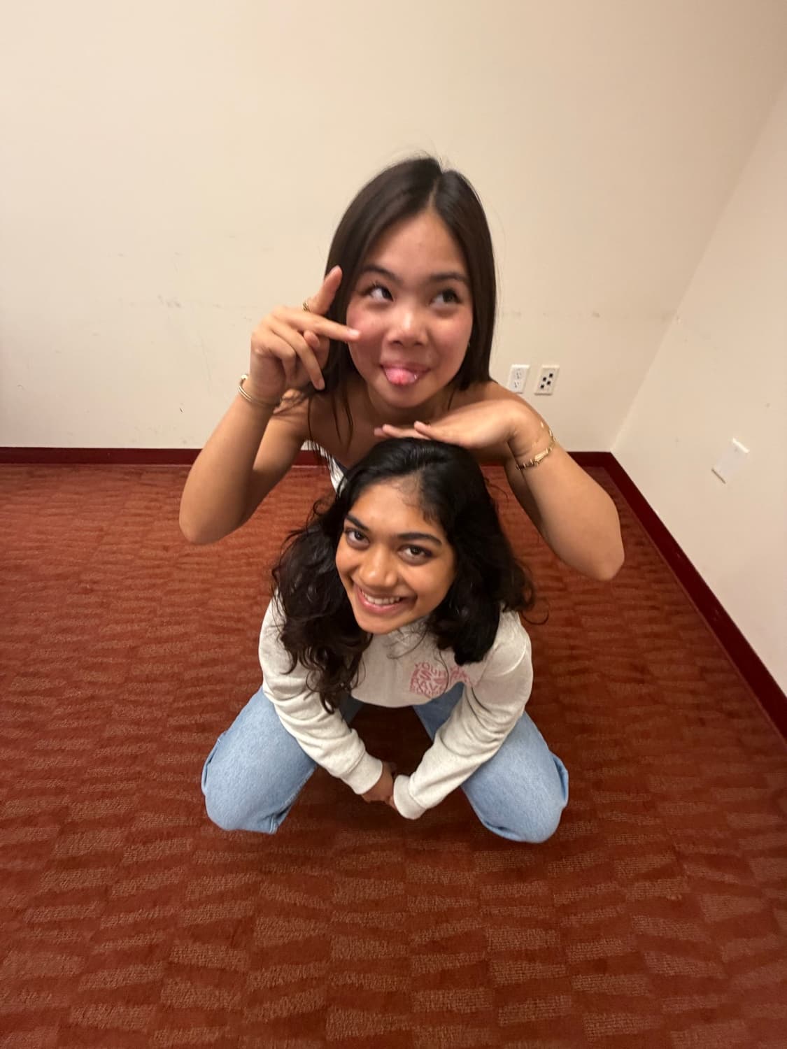 Two SCHCG members posing on the floor
