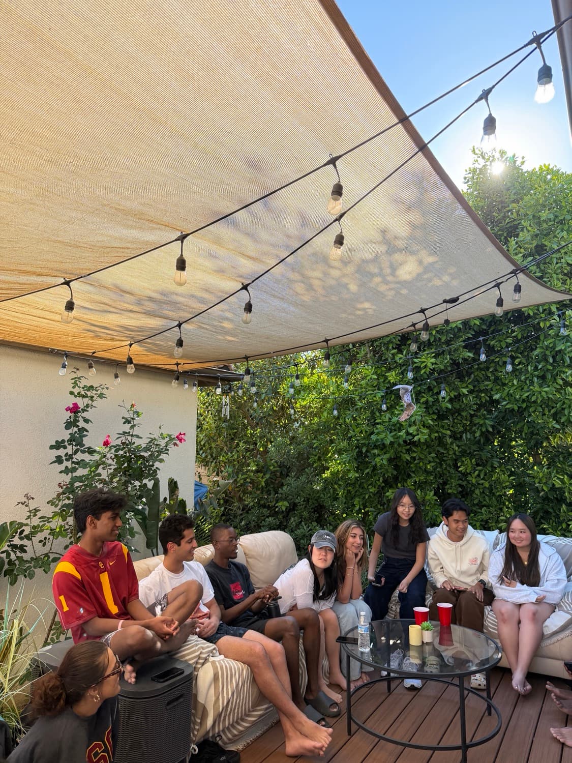 SCHCG members at the club retreat under string lights
